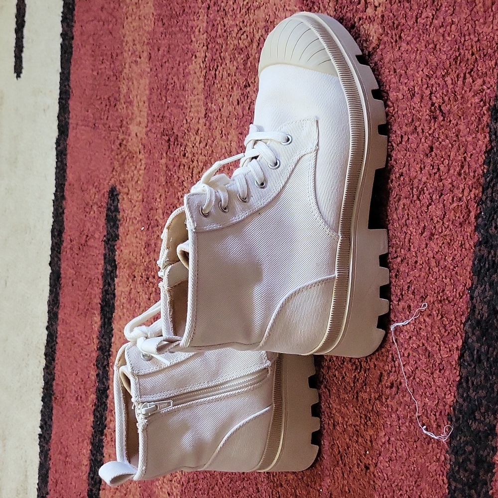 Off white laced up combat boots